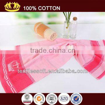 cheap100%cotton terry solid embroidery crown border towel