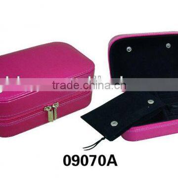 Small travel jewelry box in purple pink