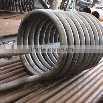 Large carbon steel tube bending by coil