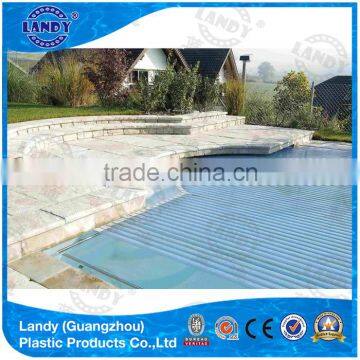 Electric swimming pool cover