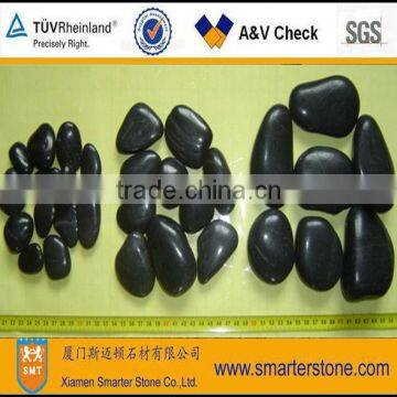 Natural polished black pebbles