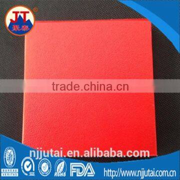 Red surface textured hdpe cutting board