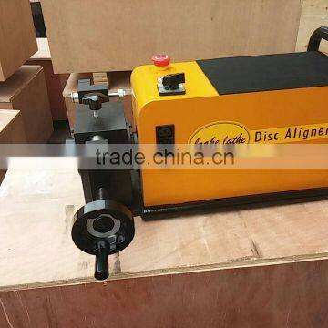 Brake disc aligner, disc brake grinding machine