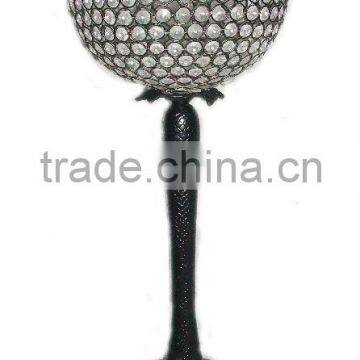 black centerpiece with crystal ball attachment, decorative orbject, party decor