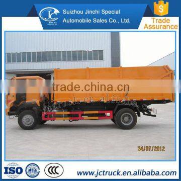 The remote control Waste compression station china howo 4x2 butt joint dump garbage truck Promotion price