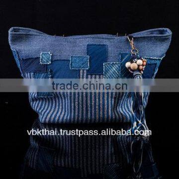 INDIGO DYED COTTON AND GALANYA YARN WITH LEATHER