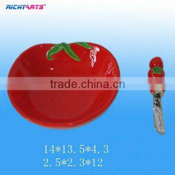 hand made ceramic plates with spreader knife in tomato shape