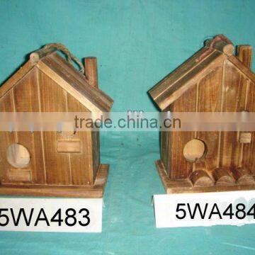 burned wooden bird house