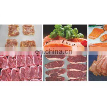 Свежие сырые свиные и говяжьи отбивные. Умный 3D-резак порций / машина для разделки порций photo-2