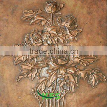 Bronze flower wall relief