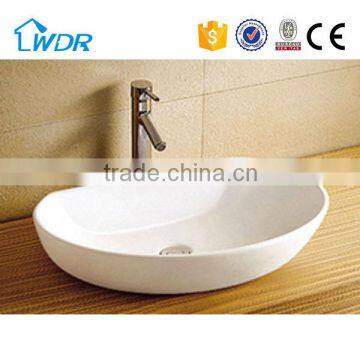 China Manufacturer Big oval Shape Ceramic Wash Art Basin