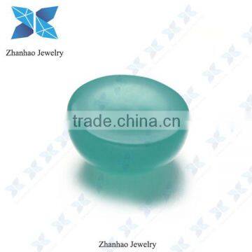 Synthetic green glass round cabochon stone