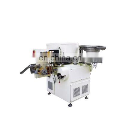 Chocolate coin wrapping machine with embossing machine