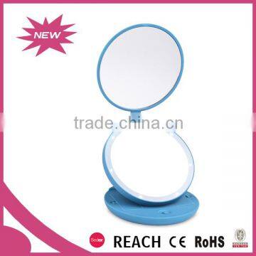 Battery operated double side magnifying vanity power folding mirror                        
                                                                                Supplier's Choice