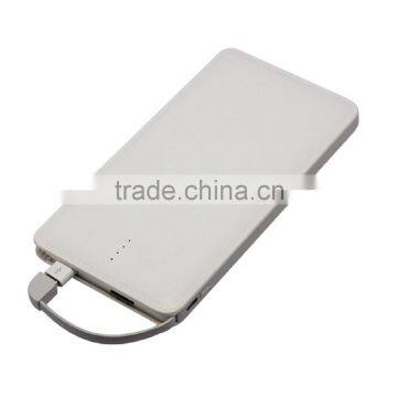 A grade li-polymer battery 10000mah power bank with built in cable