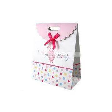 Patch handle paper gift packaging bag with bow tie