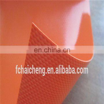 0.6mm orange color laminated PVC tarpaulin for ex-factory price