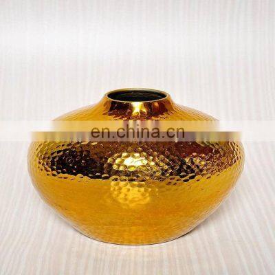 round small gold plated flower pot