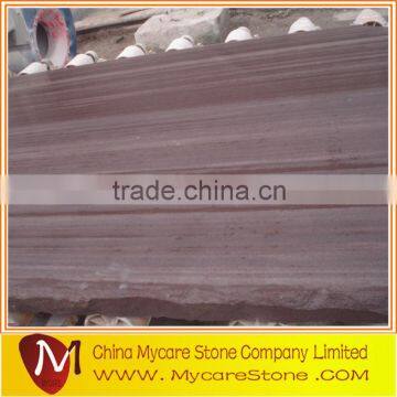 Polished purple wood sandstone slab