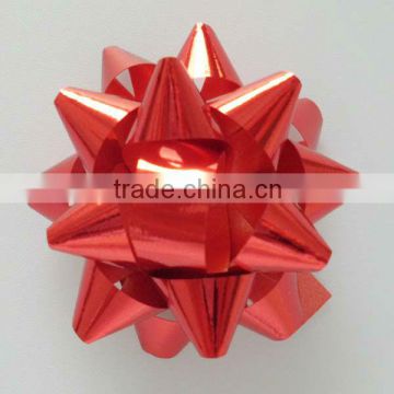 Giant Confetti Star Bow - Red, made of High Gloss PP Ribbon in 230m dia*25mm wide ribbon*30 loops