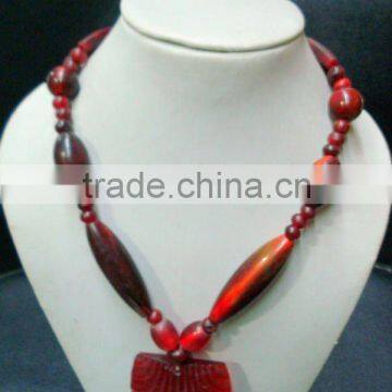 Red resin costume jewellery necklace with pendant