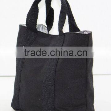 Dyed canvas tote bag with magnet button closure with cotton web handle