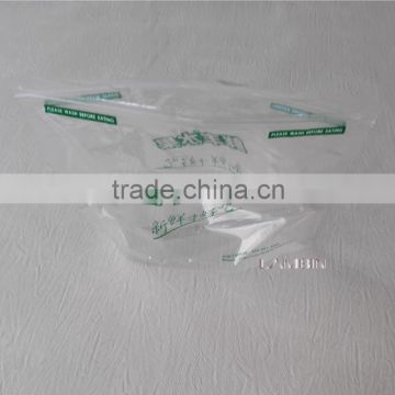 Punched self-sealing plastic packaging bag for fresh fruits