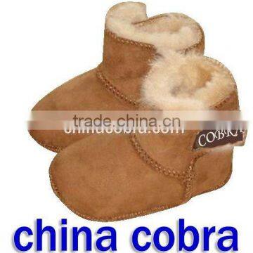 china cobra soft sole leather baby booties (newest popular design)