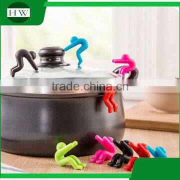 multipurpose eco silicone person phone tableware raise up anti overflow pot lid holder