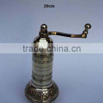 Coffee hand grinder with round base made in brass and polished finish