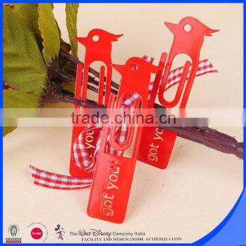 Red color painted bookmark chick shape