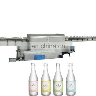 Automatic glass bottle washing machine with label removal