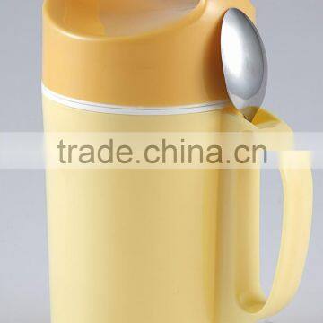 Portable food mug with spoon for convenient use