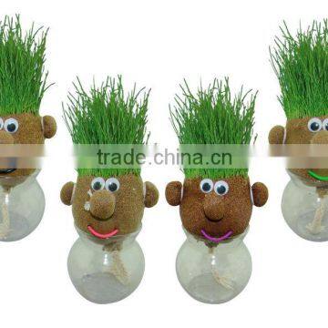 2014 new mr green head man with smile mouth grow real grass hair after watering.