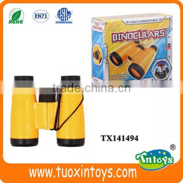 Yellow plastic children's mini toy binoculars