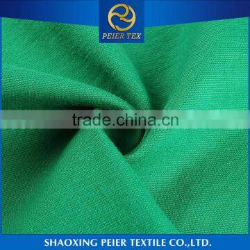 Best selling smooth 100 polyester neon spandex elastic jacquard fabric autumn and winter coat fabric