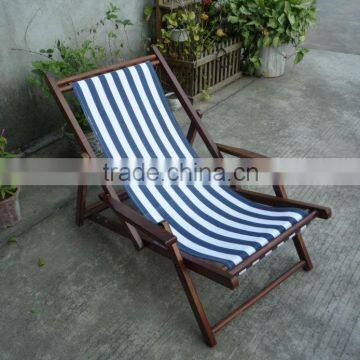 Wooden deck chair with pillow