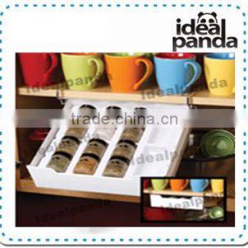 Coffee pod organizer drawer with moveable slots