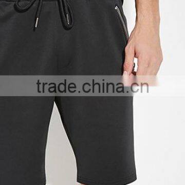 Man four minutes of pants draw string waist shorts