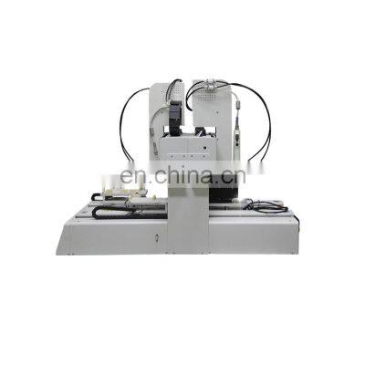 Suction type auto feeding screw locking machine