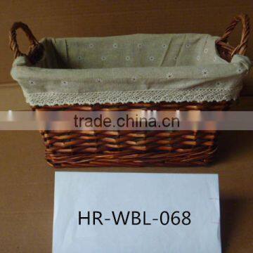 handmade rectangular wicker basket with grey cotton liner and handle