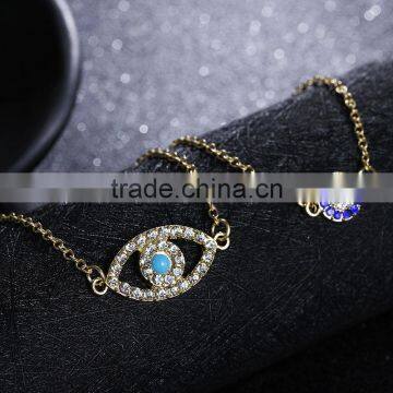 rhinestone evil eye charm gold chain bracelet