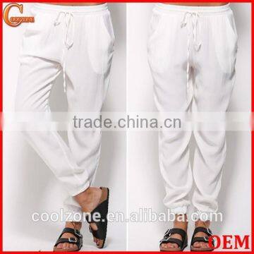 Loose fit elastic tied waist jogger pants with side pockets