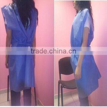 Disosable gown without sleeve in examination room