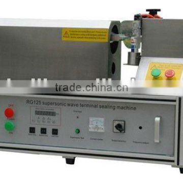 supersonic tube filling and sealing machine