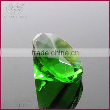 green crystal paperweight diamond