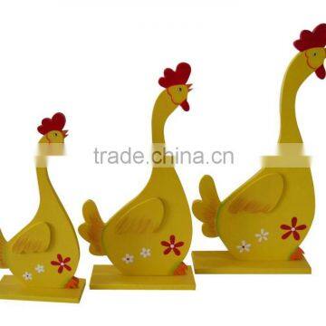 Easter Wooden yellow chooks with printing decoration on topdesk for home decorative