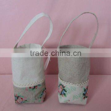 small canvas pouch bag with two long hands