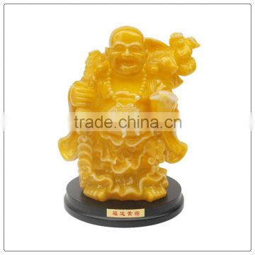 Yellow jade color buddha statue , resin buddha