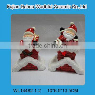 Handmade ceramic santa claus figurines in the chimney with led light                        
                                                                                Supplier's Choice